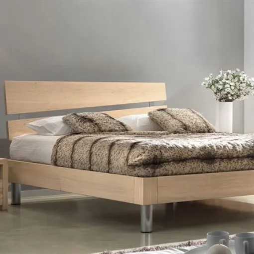 Letto con testiera in Rovere naturale con piedi cilindrici in acciaio satinato Dreams TL03 di Conarte