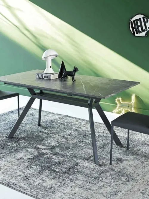 Tavolo allungabile Tecno con top in HPL effetto marmo di Sedie Brianza